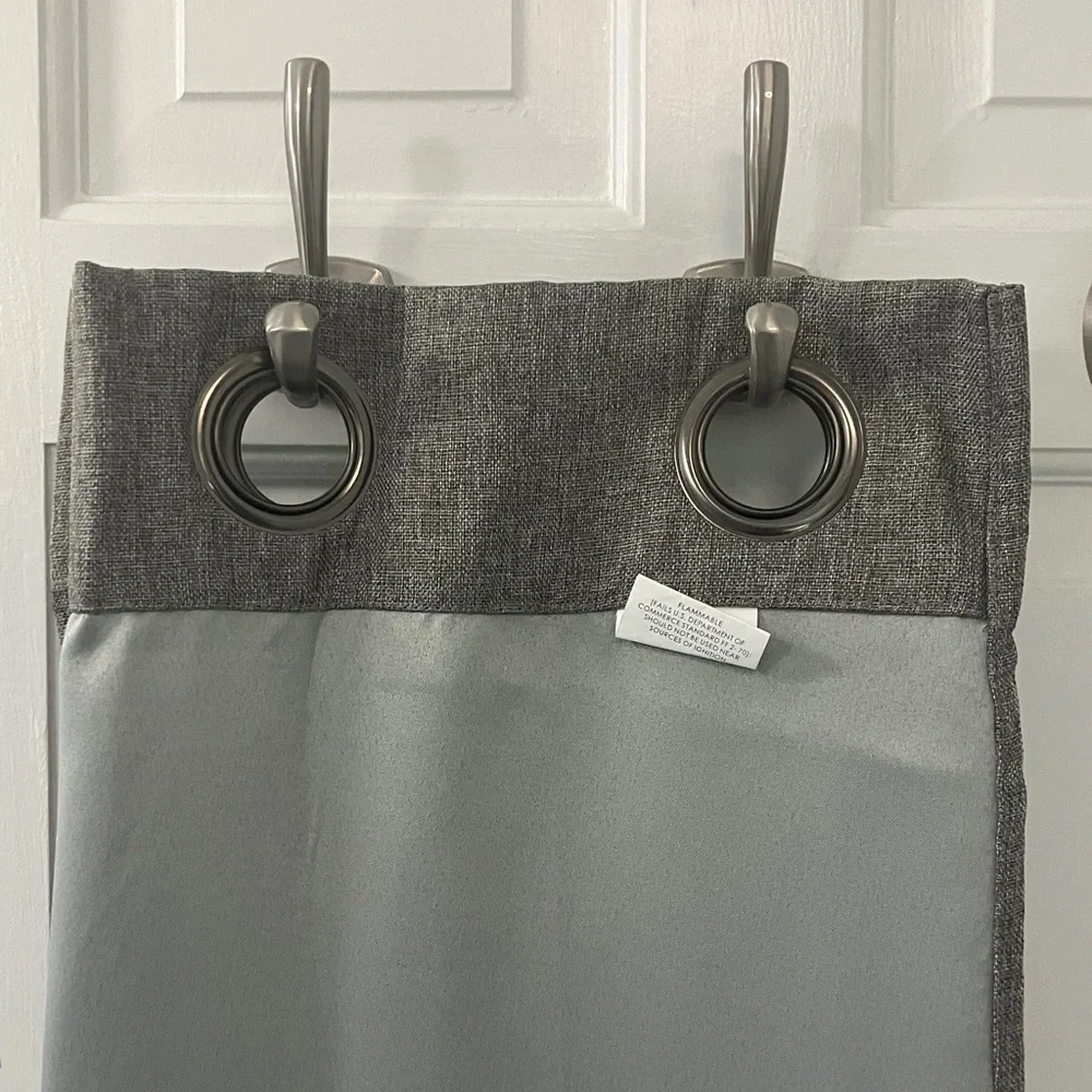 Set of 2 Grey window Curtains about 3ft by 7 ft with grommets.  rod hanging